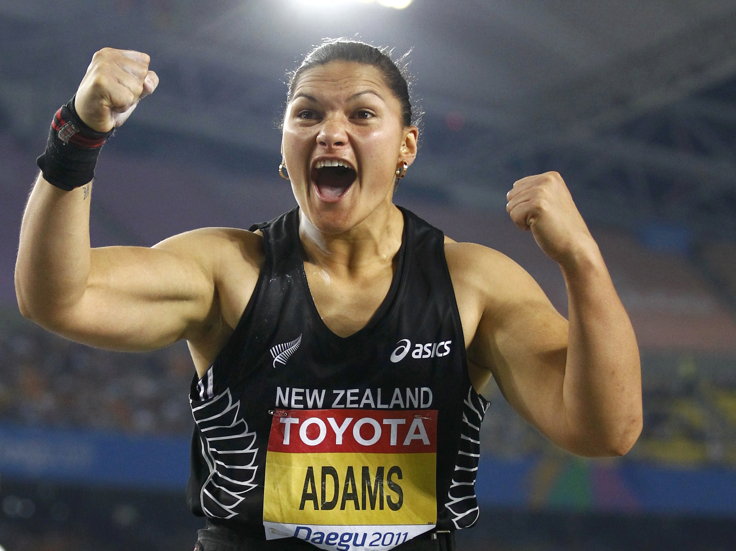 Valerie Adams of New Zealand celebrates after her attempt during the women's shot put final at the IAAF World Championships in Daegu